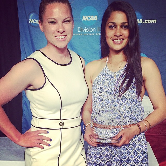 Divya Biswal with her NCAA Atlantic Region Field Performer of the Year Award and coach Kelly Curtis (l)