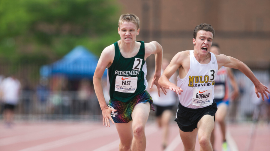 (York, Canada---09 June 2018) Joe Fast (silver) dives in a desperate attempt to get past Dakota Goguen (gold) at the finish of the junior boys 3000m at the 2018 OFSAA Ontario High School Track and Field Championships at York Lions Stadium. (Photo by Sean Burges/Mundo Sport Images)