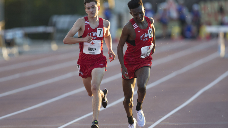 OTTAWA, ON -- 07 July 2018: Jonathan Rioux surges past Andre Alie-Lamarche to take the silver in the U20 3000m steeplechase at the 2018 Athletics Canada National Track and Field Championships held at the Terry Fox Athletics Facility in Ottawa, Canada. (Photo by Sean Burges / Mundo Sport Images).