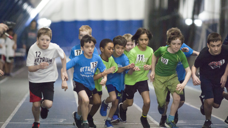 (Ottawa, Canada---20 April 2019) Chaos during the start of the 1200m at the Ottawa Lions' 2019 Easter Bunny Chase development meet in the Dome at Louis Riel High School. Photograph Copyright 2019 Sean W Burges / mundosportimages.com.