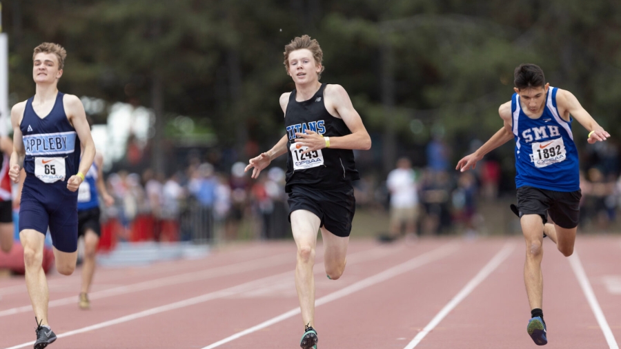 (York, Canada — 3 June 2022) L-R, William Bigler of Appleby College - Oakville, William Sanders of Mother Teresa - Ottawa, Chris Jackson of St. Mary's - Kitchener competing in the junior boys 400m final at the 2022 OFSAA Ontario High School Track and Field Championships held at the Toronto Track and Field Centre at York University. 2022 Copyright Sean Burges / Mundo Sport Images.
