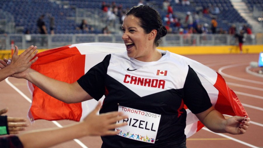 Sultana Frizell celebrates bronze medal in hammer throw at 2015 Pan Am Games. Copyright Miles Ryan Rowat