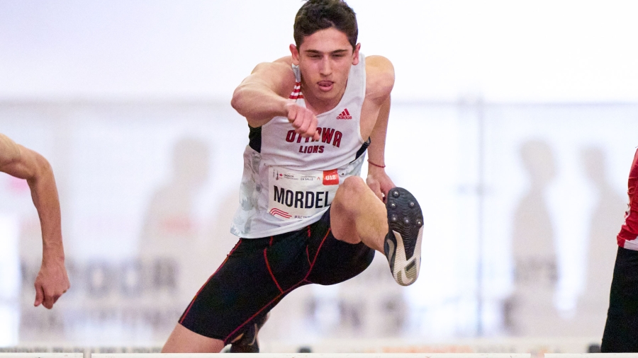 Eli Mordel running to bronze in U18 60m hurdle final on Day 1 of AC Indoor Track and Field Championships.
Copyright Geoff Robins/Mundo Sport Images