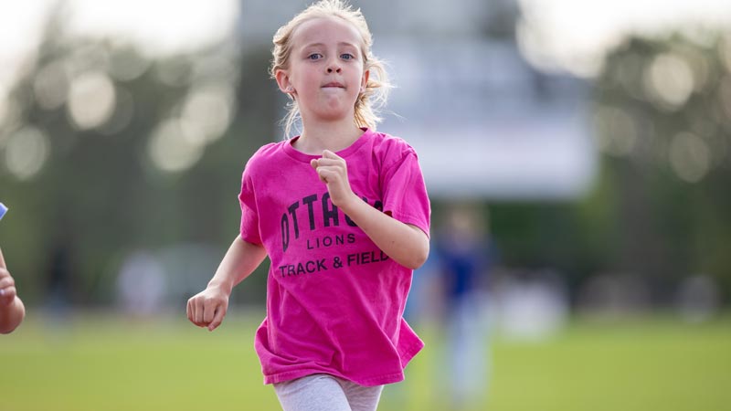 Youth camp athlete running