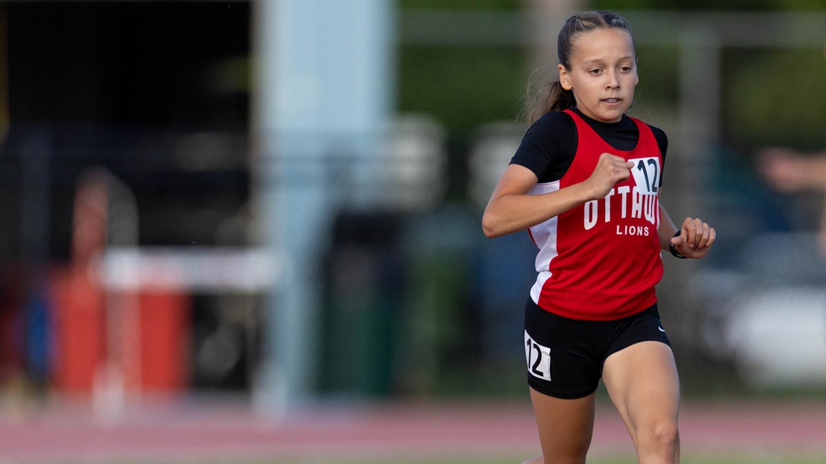 Foundation athlete competing at a Twilight Meet